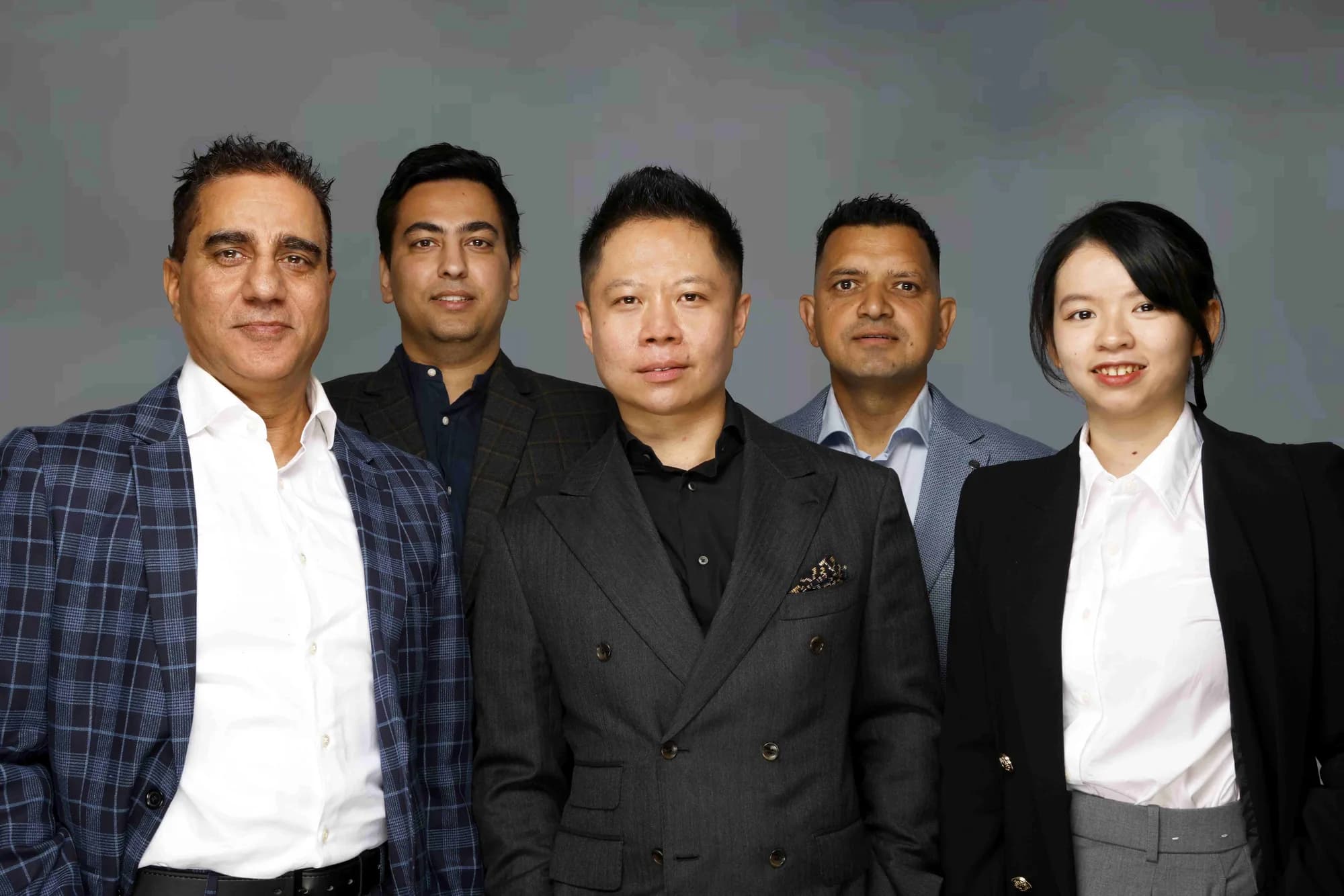 Group of colleagues photographed for a company team page, Sydney