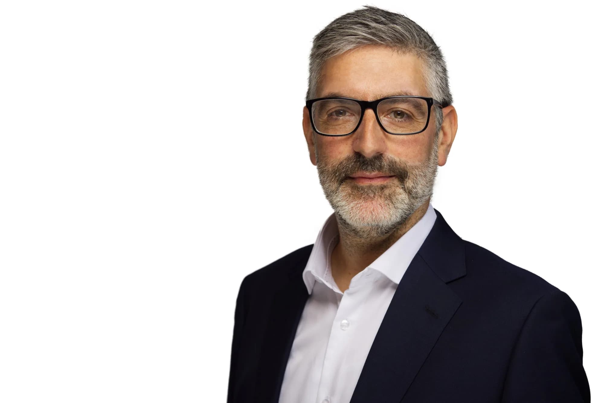 Executive portrait of a senior leader in a grey blazer, white background