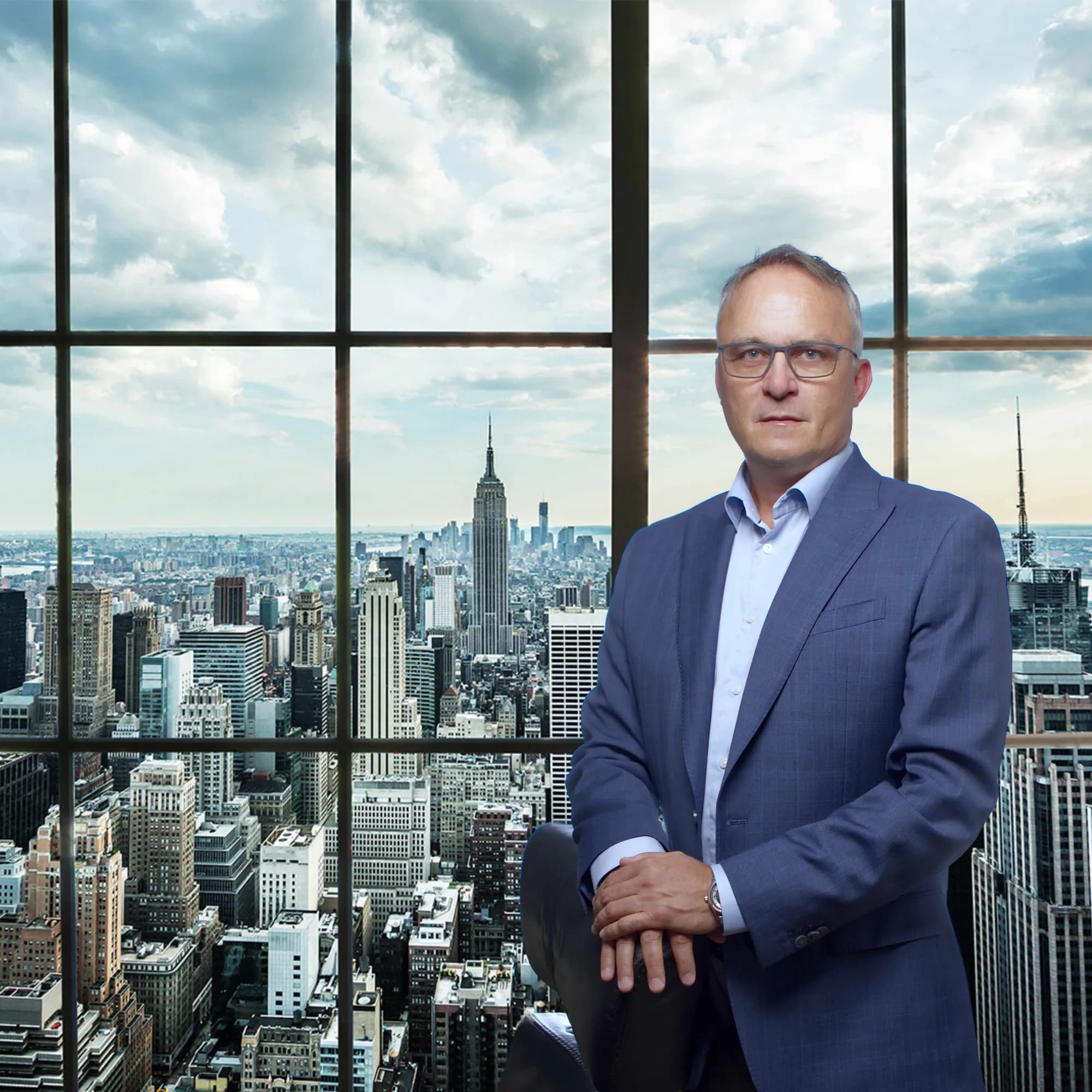 Executive portrait of a man against the Sydney city skyline